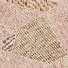 an area rug with different colored lines on it