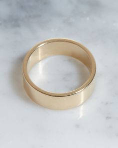 Classic Cigar Band style ring Flat/square metal band made from solid 14K Gold Gold weight of the ring is 5.24g Band is 6mm wide (tall) and 1.2mm thick This item ships within 2-3 weeks Not sure about your ring size? We'll ship you a ring sizer at no fee! Solitaire Diamond, Conversion Chart, Unisex Ring, Ring Sizer, Metal Band, Diamond Solitaire Engagement Ring, Pure Gold, Metal Bands, Gold Gold