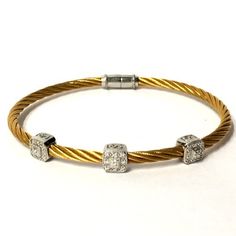 Classique Diamond Cable Bangle Bracelet Charriol Au750 Steel 3mm Gold Tone PVD Stainless Steel 3 18k White Gold Square Diamond Stations Approx .17 CTW Bead Set Diamonds Locking Magnetic Clasp Closure Exact Size & Fit As Shown Measured Excellent Preowned Condition Gold Cable Color Is Brighter Than Images Depict Worn Alone Or Stacked With Others Shown With Matching Single Station Bracelet Authenticity Guaranteed Listing Images Are Of The Actual Item Being Offered Free Shipping Within The United States Elegant Gold Bracelets With Single Cut Diamonds, Fine Gold Bracelet With Single Cut Diamonds, Luxury Gold Diamond-cut Bracelet, Luxury Gold Bangle With Single Cut Diamonds, Anniversary Gold Bracelet With Single Cut Diamonds, Luxury Flexible Gold Diamond Bracelet, Gold Cuff Bracelet With Single Cut Diamonds For Gift, Elegant Gold Bangle With Single Cut Diamonds, Luxury Gold Bangle For Anniversary