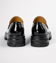 Stand-out from the crowd with our Wiz loafer. Showcasing a shiny black leather exterior, this design features an exaggerated chunky sole with a sleek rounded toe-shape, a high-cut vamp and is finished with a leather upper, lining and cushioned foot-bed. -Material: Leather Upper & Lining -Sole: Man-Made -Fit: We recommend choosing a half size down -Toe-shape: Rounded -Features: Chunky sole -Heel: 4.5cm Thigh High Boots Flat, Metallic Shoes, Tony Bianco, Bow Heels, Low Boots, Slingback Shoes, Foot Bed, Mesh Shoes, How To Stretch Boots