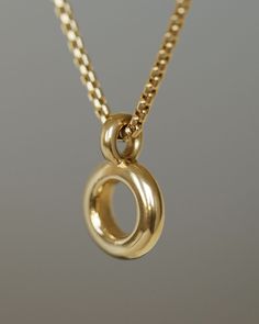 Solid 18k yellow gold donut pendant hanging on a 14k gold box chain. Soft and heavy. Minimalist Jewelry With Round Pendant Box Chain, Minimalist Jewelry With Box Chain And Round Pendant, Minimalist Rolo Chain With Round Pendant, Minimalist Rolo Chain Jewelry With Round Pendant, Luxury Jewelry Brands, Gold Pendants, Solid Gold Chains, Square Pendant, Feel Special