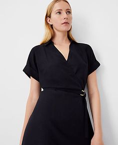 Elevate your wardrobe with the Ann Taylor Crossover Collared Midi Shirtdress, a versatile piece that promises effortless style and comfort. Perfect for a variety of occasions, this dress features a flattering crossover front and a chic point collar.

- **Size:** Regular 00
- **Color:** Black
- **Gender:** Female
- **Material:** Shell: 67% Lyocell, 18% Linen, 15% Viscose; Lining: 100% Polyester
- **Sleeve Length:** Short
- **Length:** 28 inches from natural waist
- **Fit:** Hits below the knee
- Chic Short Sleeve Belted Dress, Fitted Belted Shirt Dress For Date Night, Spring Black Belted Dress For Daywear, Black Belted Dress For Spring Daywear, Chic Short Sleeve Belted Dress For Work, Black Belted Dress For Spring Workwear, Spring Workwear Black Belted Dress, Fitted Black Belted Dress For Summer, Black Belted Collared Dress