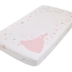 a pink and white baby's crib mattress with princess silhouettes on it