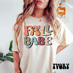 "Pumpkin Fall Tshirts Women, Pumpkin Shirt, Women's Graphic Tee, Cute Fall Shirts, Thanksgiving Shirt, Pumpkin spice Save by bundling! We offer these great discounts on bulk orders: - 25% on 5+ items (use code BUNDLE5) - 30% on 10+ items (use code BUNDLE10) - 35% on 20+ items (use code BUNDLE20) ➭ How to Order 1. Choose your shirt size & color options. 2. Select the quantity. 3. Click \"Add to Cart.\" 4. Listen for a knock at your door! ➭ Care Instructions Wash your shirt inside-out in cold/warm Retro Soft-washed T-shirt For Fall, Cute Multicolor Tops For Fall, Retro Fall Tops With Lettering, Cute Multicolor Fall T-shirt, Retro Lettering Tops For Fall, Multicolor Short Sleeve Shirt For Fall, Retro Slogan T-shirt For Fall, Retro Multicolor T-shirt For Fall, Retro White Tops With Lettering