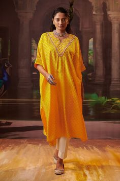 Yellow silk kaftan with placed zardozi embroidered floral motifs on a bandhani patterned base. Comes with pant. - Aza Fashions Anarkali Style Gota Work Kaftan For Festive Occasions, Wedding Kaftan With Gota Work For Festivals, Embroidered Chanderi Anarkali Kaftan, Chanderi Traditional Drape Kurta For Rituals, Traditional Drape Chanderi Kurta For Rituals, Traditional Chanderi Kurta For Rituals, Chanderi Kurta With Dupatta For Rituals, Bollywood Silk Tunic Set, Bollywood Style Silk Tunic Set