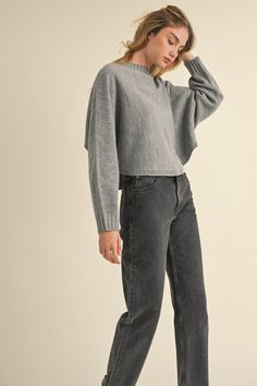 Crafted from cozy knit fabric, this cropped sweater boasts a relaxed and stylish look with its round neck and dolman sleeves. The comfortable and loose fit of the dolman sleeves add to its effortless chic styling, making it a versatile piece that can be paired with different bottoms for various outfits. Perfect for cooler weather, this sweater will keep you warm and fashionable all season long. Material composition: 100% acrylic Product measurements: S:Bust 33-35 in, Waist 25-27 in M:Bust 35-38