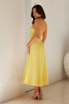 Length from bust to hem of size S: 110cm. Chest 37cm, Waist 33cm, across front only of size S. Midi dress. Semi-lined. Model is a standard XS and is wearing size XS. True to size. Non-stretch. Boning to bodice. Crisscross tie-up back. Flowy skirt. Ties to front. Split to skirt. Zipper, hook eye closure. Cold hand wash only. Polyester/Spandex. For the dreamiest look, style the Ocean Horizon Midi Dress. Featuring boning to the bodice, a crisscross tie-up back and a flowy skirt. We're in love with Coral Mini Dress, Ocean Horizon, Candy Dress, Dress Date Night, Midi Dress Formal, Prom Shopping, Skirt Zipper, Yellow Midi Dress, Dress Yellow