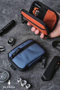 This small soft-shell pouch is the perfect storage solution for electronics, torches, tools, or anything else you may need on your next adventure. The interior features 6 internal pockets designed to hold all of those smaller items and an external pocket for coins, SD cards, etc., to keep you organized. Honda Accessories, Collector Knives, Car Emergency Kit, Multifunction Bag, Buying Stuff, Tactical Clothing, Edc Gear, Cool Gadgets To Buy, Pocket Bag