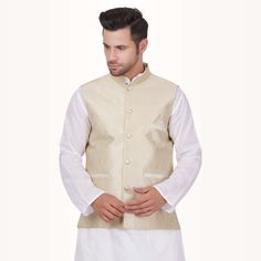 Elevate your style with our Brocade Fabric Waistcoat for men, a true embodiment of sophistication and charm. Designed to make a statement, this waistcoat adds a touch of regal elegance to your ensemble.When worn over a simple kurta and pyjama (not included), it transforms your look into one of timeless grace. Picture yourself donning this exquisite waistcoat – it exudes confidence, making heads turn at weddings, receptions, or any formal occasion.This waistcoat is more than just an accessory; it Elegant Nehru Jacket For Groom At Diwali, Elegant Sleeveless Nehru Jacket For Festive Occasion, Sleeveless Nehru Jacket For Formal Festive Occasions, Festive Sleeveless Nehru Jacket For Formal Occasions, Semi-formal Diwali Nehru Jacket, Elegant Festive Vest For Wedding, Elegant Festive Wedding Vest, Classic Nehru Jacket For Festive Semi-formal Occasions, Classic Nehru Jacket With Stand Collar For Festive Occasions