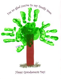 green handprints on a red tree with words written in the center and below it