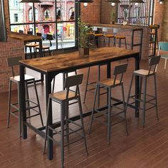 an image of a restaurant setting with bar stools and tables in front of the window