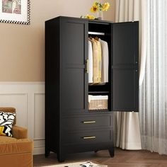 a black armoire in a living room