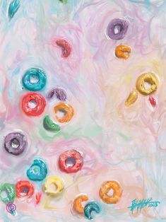 an abstract painting with colorful donuts in the middle and on top of each other