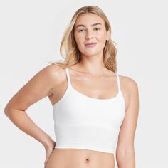 Give your everyday intimates a comfy upgrade with this Cotton Stretch Crop Cami Bralette from Auden™. This crop cami bralette is made of cotton jersey fabric with added spandex for a flexible fit that moves with you, while opaque lining provides extra coverage. The adjustable straps help you find the right fit, and unlined, wireless cups round out the design for support that maintains a natural, comfortable shape. Plus, removable padding provides a customized coverage. Auden™: Comfort true to ev Medium Support Camisole With Built-in Bra, Medium Support Cami Sports Bra With Built-in Bra, Everyday Fitted Cotton Bra, Everyday Cotton Bra, Cotton Tops With Built-in Bra And Medium Support, Medium Support Cropped Tank Top For Loungewear, Cropped Medium Support Tank Top For Loungewear, Stretch Everyday Crop Top Bra Friendly, Cotton Sports Bra With Built-in Bra And Stretch