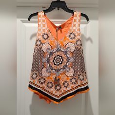 Women's Sleeves Shirt Never Worn Size Xl Orange Sleeveless Summer Vest, Orange Sleeveless Vest For Summer, Orange Summer Vest, Orange Sleeveless Top For Spring, Orange Printed Sleeveless Top, Orange Vest Top For Spring, Orange Tank Top For Beach, Summer Orange Sleeveless Blouse, Orange Sleeveless Blouse For Summer