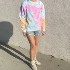 Good Day is expanding our selection! We are now offering hand-dyed tie-dye sweatshirts in the same great quality you've come to expect. Our unisex sweatshirts come in two vibrant designs and have a soft fleece inner layer. Brighten up your look by pairing with your favorite jeans or comfy sweats. Perfect for holiday gifting! Content: 80% Cotton/20% Polyester Size and Fit: Adult Unisex S-L. These sweatshirts will hit just below your waist if you take your normal size. Size up if you're looking fo Tie Dye Relaxed Fit Sweatshirt For Streetwear, Casual Hand Dyed Relaxed Fit Sweatshirt, Tie Dye Hand Dyed Crew Neck Sweatshirt, Tie Dye Crew Neck Sweatshirt For Spring, Tie Dye Long Sleeve Sweatshirt For Loungewear, Tie-dye Long Sleeve Sweatshirt For Loungewear, Hand Dyed Tie Dye Crew Neck Sweatshirt, Tie-dye Long Sleeve Loungewear Sweatshirt, Hand Dyed Tie-dye Crew Neck Sweatshirt