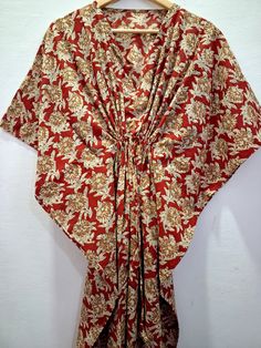 Red Beige Floral Print Kaftan Maxi Dress,Gown,Loungewear,Beach Cover Up,Long Caftan,Bridesmaid gift, gift for her,Hand Block Print Kaftan   We give free shipping on the purchase of 130 usd or more on all our products ..Coupon code is   FREESHIPPING   This kaftan is made of pure soft cotton fabric which is lightweight and flowy..The floral pattern is done by hand block printing process  by skilled artisans of Rajasthan using wooden hand carved blocks  Dyes used to print this fabric is natural veg Red V-neck Kaftan For The Beach, Red Kimono For Beach Cover-up, Traditional Red Kimono For Summer, Traditional Red Summer Kimono, Red V-neck Free Size Kaftan, Red Bohemian Tunic Kimono, Red Beachwear Kimono For Festival, Red Kimono For Festival Beachwear, Red V-neck Tunic For Vacation