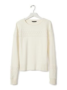 Our cream French Terry pullover sweater is a great addition to any winter outfit. The subtle lace trim makes it easy to dress up for a warm and sophisticated style | Banana Republic Fall Knit Tops With Lace Trim, Knit Tops With Lace Trim For Fall, Elegant Long Sleeve Crochet Top With Pointelle Knit, Elegant Long Sleeve Pointelle Crochet Top, Winter Crew Neck Sweater With Lace Trim, Fall Crew Neck Tops With Lace Trim, Fall Sweater With Lace Trim For Layering, Knit Long Sleeve Sweater With Lace Trim, Long Sleeve Knit Sweater With Lace Trim