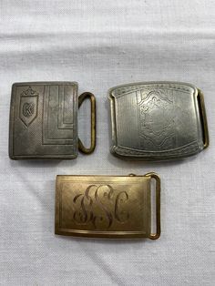 2-Edwardian Silver Plated  And 1 Gold Filled Monogramed Belt Buckles Lot Of 3 1- Wolverine silverplate buckle etched design 1-Silverplated with a K monogram 1 12 K Gold Filled monogramed belt buckle BSC Silver Engraved Rectangular Belt Buckles, Silver Rectangular Engraved Belt Buckles, Rectangular Engraved Silver Belt Buckles, Rectangular Silver Engraved Belt Buckles, Formal Gold Engraved Belt Buckles, Antique Engraved Belt Buckles For Formal Wear, Silver Rectangular Belt Buckles For Formal Occasions, Vintage Engraved Belt Buckles For Formal Occasions, Vintage Engraved Belt Buckles For Formal Wear