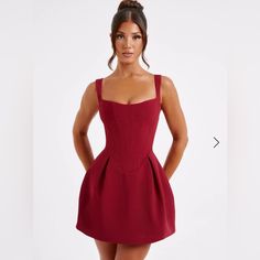 Janiyah Is The Dress For Party Season With The Prettiest Silhouette. This Mini Is Cut From A Premium, Structured Woven Fabric With A Corseted Body That Cinches The Waist And Drops To A Low V Shape. The Look Is Complete With An Iconic Voluminous Skirt. Colour: Wine. Premium Non Stretch Woven Fabric. Square Neckline. Thick, Adjustable Straps. Corseted Body With Drop V Shape. Voluminous Skirt. Zip Closure To Back. Mini Length. Model Is An Xs And Is Wearing An Xs. Model’s Measurements: Dress Size: X Backless Corset Dress, Homecoming Dresses Corset, Midi Dress Wedding Guest, Dress For Party, Wine Dress, Dress Wine, 파티 드레스, Maxi Dress Sale, Spaghetti Strap Mini Dress