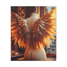 the back of a mannequin with large wings on it's chest, in front of a mirror