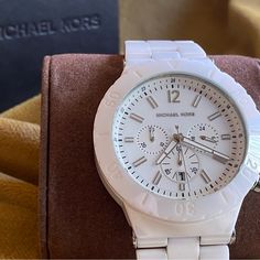 White Ceramic Watch With Original Case. Barely Worn. Needs New Battery Only. There Is A Very Small Scratch On The Glass As You Can See In The 5th Picture. Ceramic Watch, Michael Kors Accessories, The Glass, Accessories Watches, White Ceramics, Color White, Michael Kors, Women Accessories, Ceramics