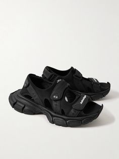 Balenciaga’s '3XL' sandals are modelled after the distressed sneakers of the same name. Designed with cutouts for breathability, they're made with comfortable scuba uppers, faux leather and canvas trims and have a trio of VELCRO®-fastening straps to adjust the fit. Casual Open Toe Sport Sandals With Rubber Waffle Outsoles, Summer Streetwear Sneakers With Vibram Sole, Leather Slip-on Sport Sandals For Streetwear, Summer Streetwear Sandals With Rubber Waffle Outsoles, Leather Slip-on Sandals For Streetwear, Sporty Summer Sport Sandals With Vibram Sole, Leather Sneakers With Vibram Sole For Summer, Summer Leather Sneakers With Vibram Sole, Streetwear Sport Sandals With Rubber Sole And Open Toe