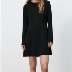 Size: Small Little Black Dress Skater Style True To Size- Dress Has Very Little Stretch Brand New Chic Black Stretch Long Sleeve Dress, Sleek A-line Dresses For Fall, Black Mini Length Long Sleeve Dress For Spring, Black Stretch Long Sleeve Dress For Date Night, Sleek Black Long Sleeve Mini Dress, Chic Black Mini Length Long Sleeve Dress, Chic Black Long Sleeve Mini Dress, Chic Black Long Sleeve Dress For Date Night, Black Sleek Long Sleeve Evening Dress