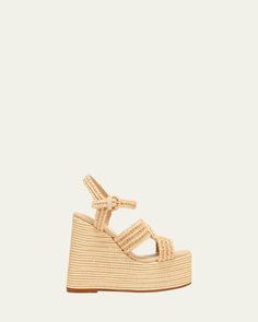 Castaner "Fiodora" woven raffia platform sandals    3.15 in / 80 mm braidedjute wedge heel; 2.00 in / 50 mm platform    Open toe    Adjustable ankle strap    Rubber outsole    Lining: Leather    Do not iron, dry clean    Made in Spain Straw Platform Espadrilles, Natural Color Wedge Heel Sandals With Heel Strap, Natural Heels With Woven Sole And Ankle Strap, Natural Ankle Strap Heels With Woven Sole, Straw Platform Wedge Heels, Natural Sandals With Woven Sole And Wedge Heel, Open Toe Straw Wedge Sandals With Heel Strap, Straw Wedge Heels With Platform, Natural Straw Platform Espadrilles