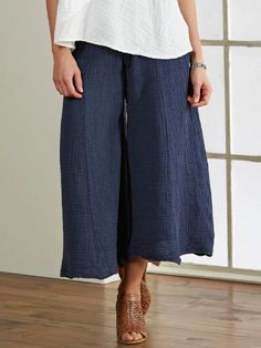 Blue Casual Solid Plain Loose Pants Indigo Baggy Wide Leg Bottoms, Indigo Wide-leg Cotton Bottoms, Indigo Relaxed Fit Wide-leg Pants, Indigo Relaxed Fit Bottoms For Spring, Indigo Wide Leg Bottoms With Relaxed Fit, Indigo Wide Leg Pants With Elastic Waistband, Indigo Baggy Bottoms For Spring, Casual Indigo Pants With Loosely Fitted Hips, Indigo Straight Leg Pants With Elastic Waistband