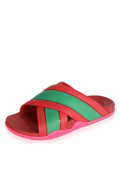 These sandals from Gucci boast the instantly recognizible Web detail and a contrasting pink sole.Green and red Web rubber Open toe Slip-on styleMoulded footbed Crisscross straps Embossed Gucci logoBranded insoleComposition: Rubber 100%Lining: Rubber 100%Sole: Rubber 100%Made in Italy Chevron Outfit, Chevron Jewelry, Gucci Slides, Web Detail, Gucci Shop, Red Web, International Clothing, Shoes Flats Sandals, Luxury Women Fashion