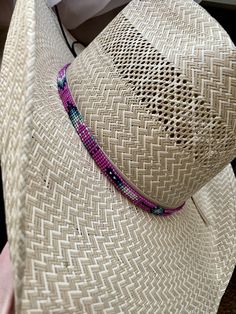 "1/4\" wide Pink Arrow Hat Band. All bead work is beaded with 10lb extreme braided nylon line. All hat bands are finished at 23\" with glued than sewed down leather ends and an adjustable leather tie." Adjustable Country Hat Bands For Kentucky Derby, Adjustable Country Style Hat Band For Kentucky Derby, Adjustable Handwoven Straw Hat For Kentucky Derby, Handwoven Adjustable Straw Hat For Kentucky Derby, Country Style Hat Band For Kentucky Derby, Adjustable Handwoven Straw Hat For Rodeo, Adjustable Beaded Fedora Hat Band, Western Braided Hat Band For Festivals, Adjustable Western Woven Hats