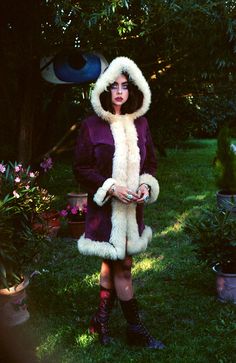 These are so rare to find from this era  This beauty is made from genuine purple suede with real curly lamb shearling trim. It has hood & front hooks.  So extremely beautiful & rare ICONIC vintage collectable 1960's / 1970's shearling sheepskin coat!  ⫸True Vintage! 60's 70's WOODSTOCK Era. Made in London/England ⫸ Very unique style with real  sheep fur! ⫸ AMAZING timeless design ⫸  This warm & snuggly beauty is sure to be the star of your wardrobe! ⫸ Condition: This is a VINTAGE Item, a true wo Winter Costume Outerwear With Faux Fur Lining, Vintage Hooded Fur Coat For Fall, Bohemian Winter Costume Outerwear, Retro Winter Festival Outerwear, Vintage Winter Costume Outerwear, Hippie-style Fitted Winter Outerwear, Hippie Style Fitted Winter Outerwear, Fitted Hippie Winter Outerwear, Fitted Hippie Outerwear For Winter