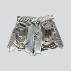 Be the fashion trendsetter of the summer with our Y2K-style. fringe pocket distressed denim shorts from our 2023 Summer Collection! With a high-rise cut. straight silhouette and embellished details. these shorts make a bold statement that's sure to turn heads.What Makes These Shorts a Must-Have Y2K Style: Take a fashionable leap into the past and embrace the vintage-inspired vibe of the new millennium. High-Rise Cut: Complement every body type with a flattering silhouette and a touch of modern s Trendy Fringe Jeans For Summer, Trendy Summer Jeans With Fringe, Trendy Fringed Summer Jeans, Chic Ripped Jean Shorts, Summer High Waist Jeans With Fringe, Trendy High Rise Fringe Shorts, Casual Jeans With Rhinestone Fringe, High-waist Denim Jean Shorts With Fringe, High Waist Denim Jean Shorts With Fringe