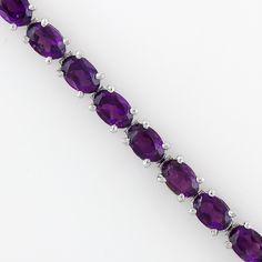 Step into the world of elegance and mystique with our Natural African Amethyst Bracelet. This exquisite piece of jewelry is more than just an accessory, it's a statement. Handcrafted with love and precision, this bracelet is a perfect gift for your wife or a treat for yourself. Key Features: Authentic African Amethyst: Sourced from the heart of Africa, the amethyst in this bracelet carries a rich history and a unique charm that sets it apart. Healing Gemstone: Known for its healing properties, t Luxury Amethyst Bracelets For Formal Occasions, Purple Round Tennis Bracelet For Formal Occasions, Elegant Sterling Silver Amethyst Bracelet For Formal Occasions, Elegant Sterling Silver Round Amethyst Bracelet, Elegant Round Amethyst Sterling Silver Bracelet, Luxury Purple Jubilee Bracelet, Elegant Amethyst Crystal Bracelet, Elegant Purple Sterling Silver Bracelet For Formal Occasions, Elegant Round Amethyst Crystal Bracelet