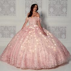 The fairy tale quinceanera ball gown features stunning three-dimensional floral appliques and a semi-sweetheart neckline with feather detailing. This beautiful dress also includes a small matching cape. Quinceanera Dresses Damas, Fabric Beading, Quinceañera Dresses, Damas Dresses, Pink Quince, Quinceanera Dresses Pink, Big Dresses, Pretty Quinceanera Dresses, Quince Ideas