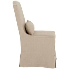 the back of a beige chair with a pillow on it's arm and legs