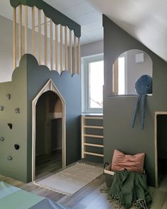 a room with a dog house and stairs