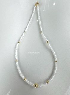 Gold Beaded Necklaces With Faceted Beads For Everyday, Gold Beaded Necklace With Faceted Beads For Everyday, White Pearl Beaded Necklaces In Rondelle Shape, White Pearl Beaded Necklace In Rondelle Shape, White Beaded Chain Dainty Jewelry, White Beaded Chain Necklace For Everyday, White Dainty Beaded Chain Jewelry, Everyday White Faceted Beaded Necklace, Dainty White Beaded Chain Jewelry