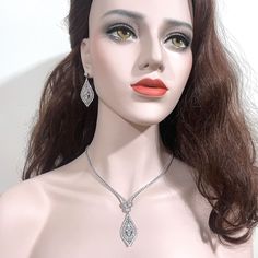 "Stunning Hollywood glamour bridal jewelry featuring statement wedding necklace and old vintage style Victorian bridal earrings on sterling posts, made of top-grade clear cubic zirconia in bright silver rhodium tarnish-resistant base. You may choose earrings only, necklace only or earrings necklace set. Earrings measure about 1 7/8\" (4.8cm) with posts. Necklace total length measures 17\" (43 cm) when opened up and put on a straight line. It secures with a snap clasp. View matching pieces or sim Glamorous Hand Set Bridal Earrings For Wedding, Exquisite Hand-set Bridal Earrings For Wedding, Exquisite Hand Set Bridal Earrings For Wedding, Elegant Diamond White Bridal Earrings For Wedding, Silver Bridal Earrings With Intricate Design For Wedding, Glamorous Wedding Jewelry With Intricate Design, Intricate Design Bridal Earrings For Wedding, Diamond Bridal Earrings With Intricate Design For Wedding, Elegant Silver Bridal Set With Intricate Design