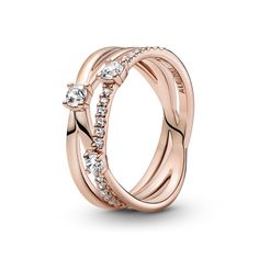 For a classic touch, go for the Pandora Sparkling Triple Band Ring. Hand-finished in a 14k rose gold-plated unique metal blend, this style features three interlinked rings. Small clear cubic zirconia decorate the top of one ring shank, while three bigger stones are set across all three for extra sparkle. As this wide-band ring has a pre-stacked look, teaming it with other shimmering Pandora Timeless rings will make a bold statement. This ring is a size 7. Pandora Style #: 189400C05-54 Timeless Rings, Silver Wedding Gifts, Triple Band Ring, Pave Setting Ring, Pandora Rose, Pear Shaped Ring, Timeless Ring, Popular Rings, Ring Shank