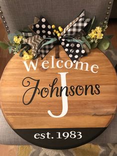 a wooden sign that says welcome to johnsons