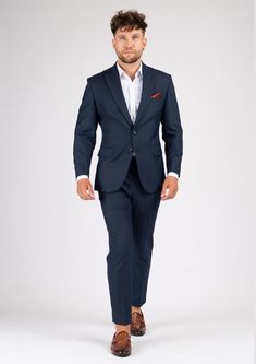 The Bryant Navy Sharkskin Suit is the perfect choice for any smart occasion. Crafted with a luxurious navy sharkskin fabric and custom made for a premium appearance, it has a deep blue color, a stylish and modern cut, and will make you look and feel confident. Modern Blue Suits For Business Casual, Modern Blue Suits With Notch Lapel, Modern Blue Suit For Business Casual, Modern Blue Suit With Notch Lapel, Navy Fitted Suit With Notch Lapel, Navy Fitted Suits For Office, Fitted Navy Suit For Office, Navy Fitted Suit For Office, Navy Professional Office Suits