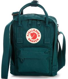 From Fjallraven&#x2C; the Kanken sling crossbody bag features: Vinylon F: 100% vinylalVersatile shoulder bag made in hardwearing Vinylon F fabricFront pocket&#x2C; main compartment and zippedrear compartmentName and address label inside main compartmentWear as crossbody sling or hold with double handlesApprox. 7.8" H x 5.9" W x 4.3" DApprox. 2.5 L capacityApprox. 6.75 ounces weight Imported. Fjallraven Kanken Sling, Kanken Sling Bag, Fjallraven Mini, Kanken Sling, Fjällräven Kånken, Kanken Mini, Sling Pack, Compact Bag, Brno