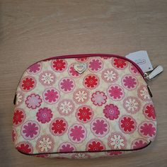 Coach Multicolor Coated Canvas Zip-Around Makeup Bag Cosmetic Bag Case Nwt. . Floral Print Cosmetic Case (Coach F50675) Coach Style # F50675 Floral Print Coated Canvas Inside Open Pockets Zip-Top Closure, Fabric Lining 8 3/4" (L) X 6" (H) X 2 1/4" (W) Coach Beige Bag With Zipper Pouch, Pink Shoulder Cosmetic Bag, Pink Coach Pouch Bag, Pink Travel Cosmetic Bag For Spring, Coach Pink Pouch Shoulder Bag, Pink Coach Bag With Zipper Closure, Spring Coach Pouch Bag, Coach Travel Bag With Zipper Pouch, Pink Cosmetic Bag For Everyday Use In Spring