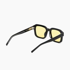 BLACK ACETATE / YELLOW LENS / SILVER HARDWARE DESCRIPTION Vera is a versatile look with vintage vibes. This 70s-inspired frame features a large, rectangular design that’s finished with custom temple cores for a subtle touch of individuality. We plant a tree for each pair of glasses sold on our website in partnership wi Modern Rectangular Yellow Sunglasses, Modern Yellow Rectangular Sunglasses, Wide Face, Barrel Hinges, Plant A Tree, Prescription Eyewear, Instagram Tags, Eyewear Brand, 70s Inspired