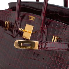 Hermes Birkin HSS 35 featured rich Bordeaux in Porosus Crocodile. An exquisite Hermes crocodile handbag in jewel toned deep bordeaux.Accentuated with gold hardware.This special order genuine crocodile skin bag is a magnificent addition to any Hermes handbag collection.Comes with lock, keys, clochette, sleepers, raincoat and signature Hermes box.NEW or NEVER For 22 years Mightychic has offered superb customer service that meets exquisite Hermes selections at your fingertips. final sale BAG MEASUR Hermes Bag Collection, Hermes Crocodile, Hermes Birkin Handbags, Crocodile Handbags, Birkin Handbags, Handbag Collection, Hermes Box, Luxury Purses, Crocodile Skin