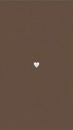 a white heart on a brown background