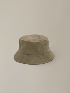 Editor's NoteThe classic look is reinterpreted in a modern sense. - Basic designed cotton bucket hat- Lightweight and durable- NW embroidery logo label- Washed material used to resist wrinkles Measurements (in.)- Head Girth: 23.62 in.- Height: 2.17 in. Composition & Care- 100% Cotton- Avoid direct heat and moisture- Do not tumble dry- Products may be damaged by alcohol, oil, cosmetics, etc. Designer- by NOTHING WRITTEN Khaki Cotton Bucket Hat With Curved Brim, Khaki Cotton Bucket Hat With Short Brim, Khaki Cotton Sun Hat With Curved Brim, Khaki Brimmed Cotton Bucket Hat, Khaki Cotton Wide Brim Bucket Hat, Nothing Written, Cotton Hat, Logo Label, Embroidery Logo