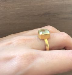 "A cushion shaped Prehnite, which is a lovely soft green hue make a great stackable ring. Wrapped in a box ready for gift giving.(r-117) Final Sale Prehnite measure 10.5mm ---> Don't know your ring size? Purchase our ring sizing gauge https://www.etsy.com/listing/290720637/ring-sizer-ring-sizing-gauge-multisizer?ga_search_query=ring+sizer&ref=shop_items_search_1 *Follow us @instagram for promotions *LIKE* us on Facebook http://www.facebook.com/Belesas to find special coupon codes *If you Green Stone Ring, Chalcedony Ring, Green Chalcedony, Square Ring, Bezel Ring, Square Rings, Ring Sizer, Stackable Ring, Green Onyx